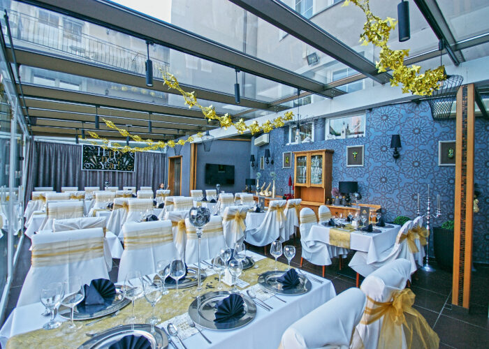 Xavin Hotel Harkány, szilveszteri rendezvény és csomagajánlat, télikert a megterített asztalokkal